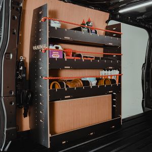 Rear van side angle view of the Ford Transit Custom LWB 2023- NS Rear Adjustable Compartment Hexaboard Van Racking