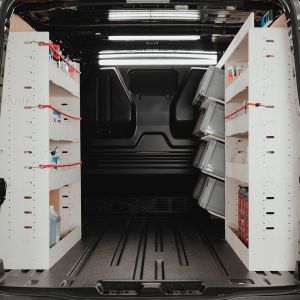 Rear van view of the Ford Transit Custom 2023- LWB Adjustable Triple Van Racking with Toolbox Shelving
