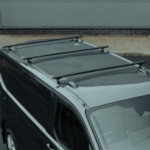 Close-up view of the Transit Custom 2023- Black Aluminium Roof Cross Bars