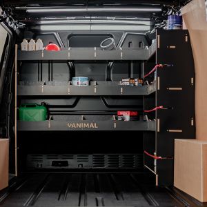 Rear van view of the Toyota Proace 2016- Hexaboard Integrated Right Hand Front & Bulkhead Racking displaying equipment, tools and boxes