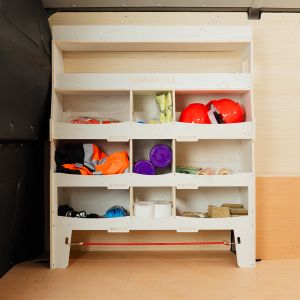 Side van view of the Nissan NV300 2016- Front Ulti-Rack Van Racking displaying equipments, tools and boxes