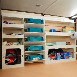 Side angle van view of the Toyota Proace 2016- Driver Side Ulti-Rack Van Racking V2 displaying Makita equipment, tools and boxes