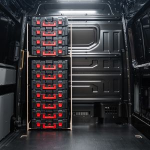 Rear van view of the MAN TGE 2017+ Milwaukee Packout Toolbox Compatible Van Racking - Bulkhead displayed with Milwaukee toolboxes