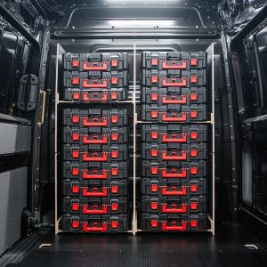 Rear van view of the MAN TGE 2017+ Milwaukee Packout Toolbox Compatible Van Racking - Full-Width Bulkhead - displayed with Milwaukee toolboxes