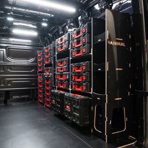 Rear van side angle view of the MAN TGE 2017+ Milwaukee Packout Toolbox Compatible Van Racking (Full OS) displayed with Milwaukee toolboxes 