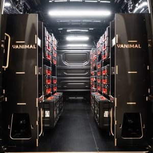 Rear van view of the MAN TGE 2017+ Milwaukee Packout Toolbox Compatible Van Racking (x3 V1) displayed with Milwaukee toolboxes