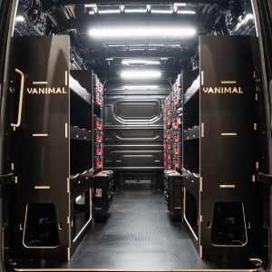 Rear van view of the MAN TGE 2017+ Milwaukee Packout Toolbox Compatible Van Racking (x3 V2) displayed with Milwaukee toolboxes