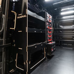 Rear van side angle view of the MAN TGE 2017+ Milwaukee Packout Toolbox Compatible Van Racking - NS Rear V2 displayed with Milwaukee toolboxes