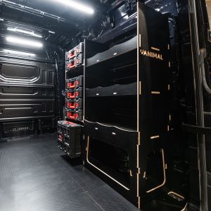 Rear van side angle view of the MAN TGE 2017+ Milwaukee Packout Toolbox Compatible Van Racking - OS Rear V2 displayed with Milwaukee toolboxes
