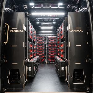 Rear van view of the MAN TGE 2017+ Milwaukee Packout Toolbox Compatible Van Racking (x3 V3) displayed with Milwaukee toolboxes