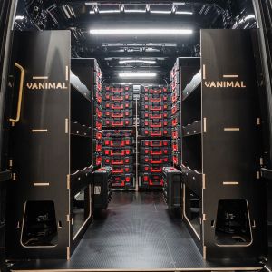 Rear van view of the MAN TGE 2017+ Milwaukee Packout Toolbox Compatible Van Racking (x3 V4) displayed with Milwaukee toolboxes 