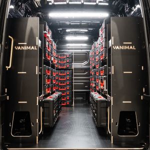 Rear van view of the MAN TGE 2017+ Milwaukee Packout Toolbox Compatible Van Racking (x4 V1) displayed with Milwaukee toolboxes