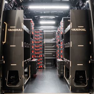 Rear van view of the MAN TGE 2017+ Milwaukee Packout Toolbox Compatible Van Racking (x4 V2) displayed with Milwaukee toolboxes