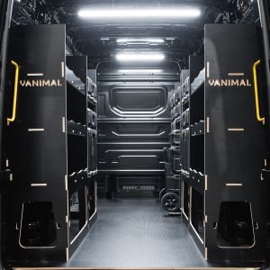 Rear van view of the MAN TGE 2017+ DeWalt ToughSystem 2.0 Trolley Compatible Van Racking (x3 V2) displayed with DeWalt ToughSystem 2.0 toolboxes and trolley