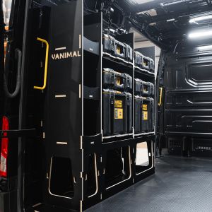 Rear van side angle view of the MAN TGE 2017+ DeWalt ToughSystem 2.0 Toolbox Compatible Van Racking - NS Rear displayed with DeWalt ToughSystem 2.0 toolboxes