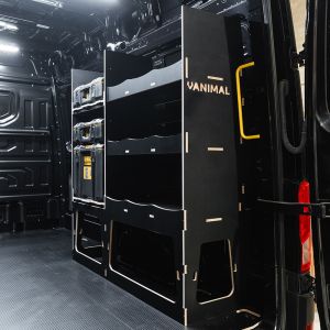 Rear van side angle view of the MAN TGE 2017+ DeWalt ToughSystem 2.0 Toolbox Compatible Van Racking - OS Rear V2 displayed with DeWalt ToughSystem 2.0 toolboxes