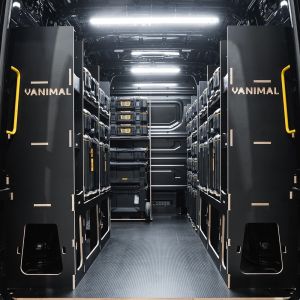 Rear van view of the MAN TGE 2017+ DeWalt ToughSystem 2.0 Trolley and Toolbox Van Racking (x4 V1) displayed with DeWalt ToughSystem 2.0 toolboxes and trolley
