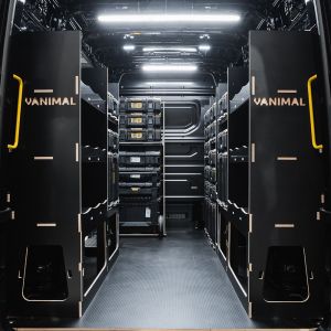 Rear van view of the MAN TGE 2017+ DeWalt ToughSystem 2.0 Trolley and Toolbox Van Racking (x4 V2) displayed with DeWalt ToughSystem 2.0 toolboxes and trolley