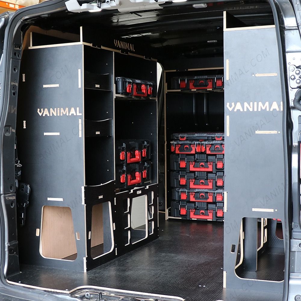 Rear van NS angle view of the Kia PV5 Cargo Milwaukee Packout Toolbox Compatible Van Racking (x3 V1) displayed with Milwaukee toolboxes and top trays