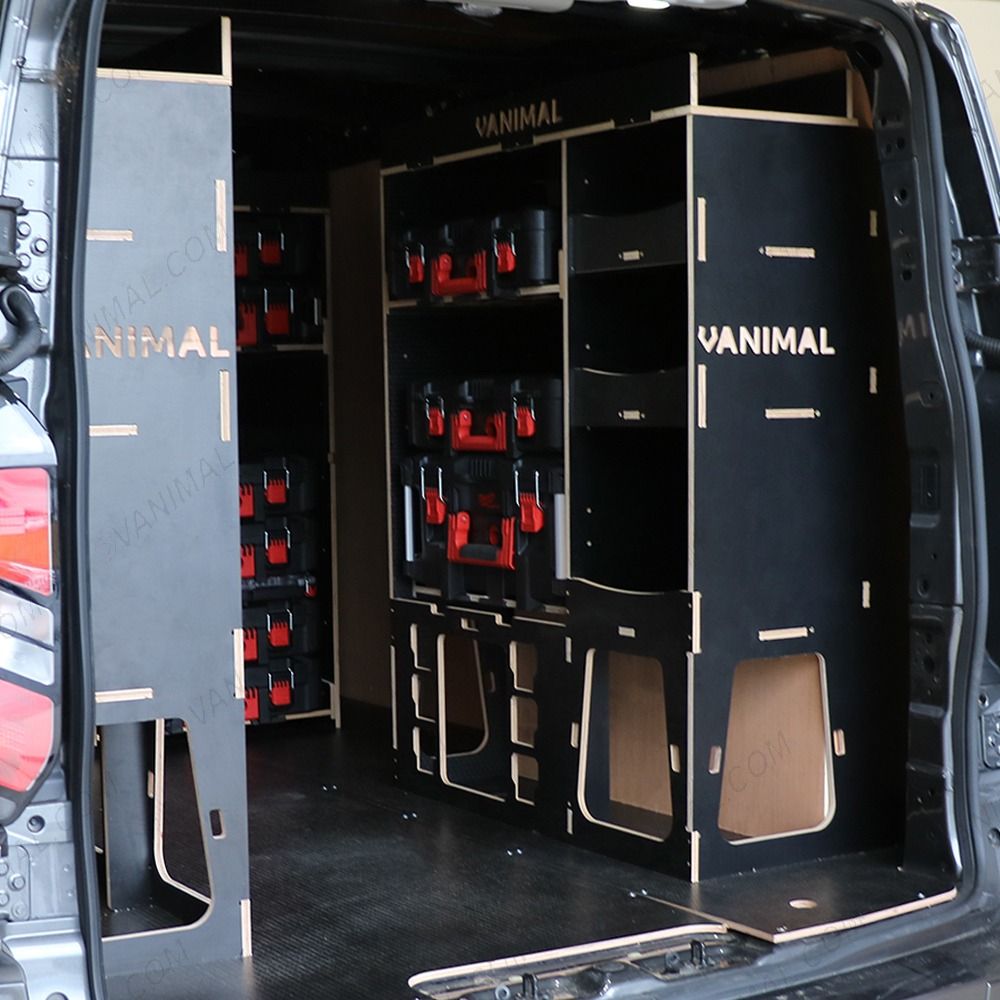 Rear van OS angle view of the Kia PV5 Cargo Milwaukee Packout Toolbox Compatible Van Racking (x3 V1) displayed with Milwaukee toolboxes and top trays