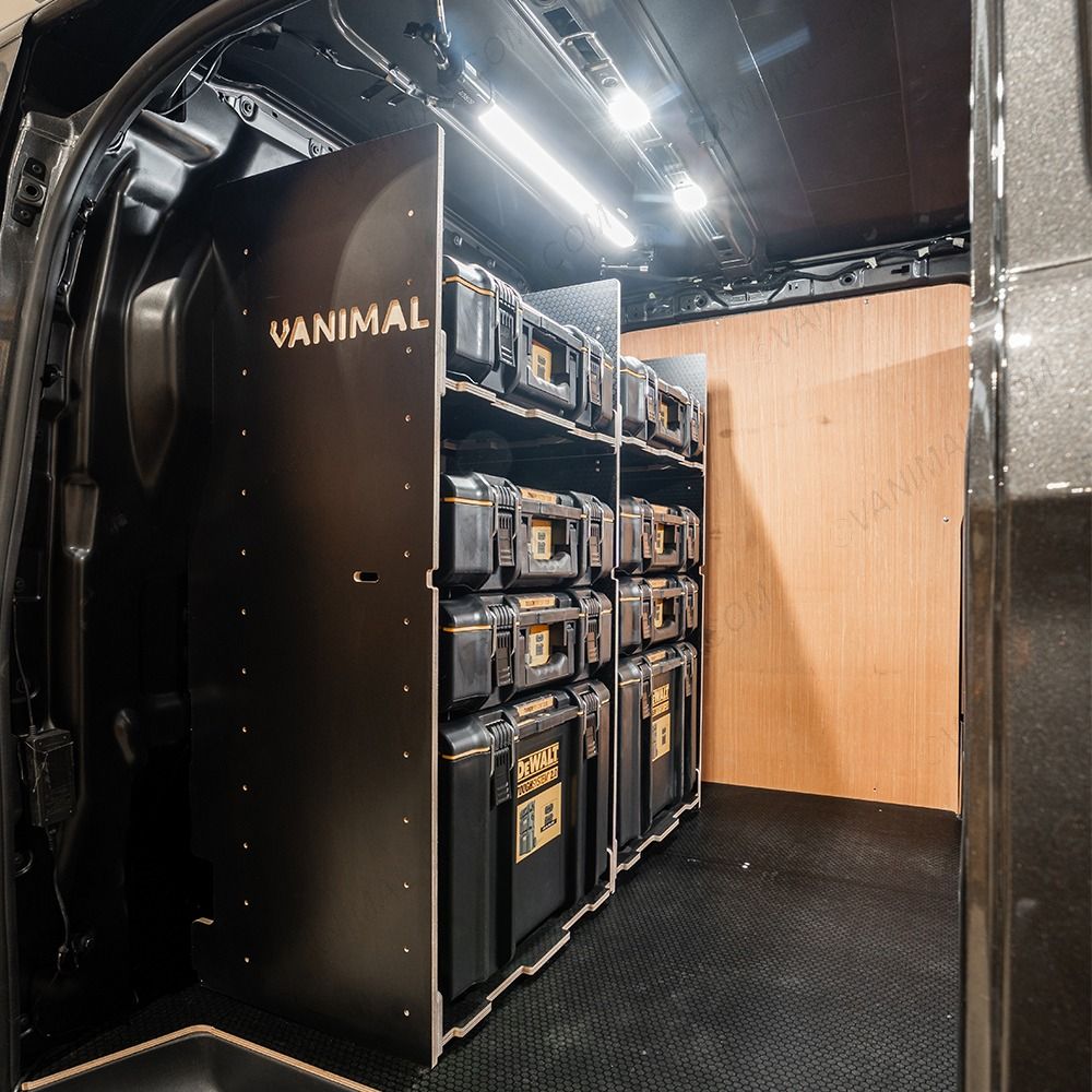 Side van view of the bulkhead section of the Kia PV5 Cargo DeWalt ToughSystem Toolbox Compatible Van Racking (x3 V1) displayed with DeWalt ToughSystem toolboxes