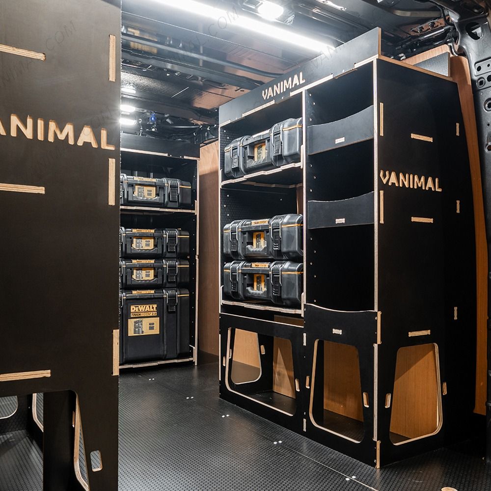 Rear van OS angle view of the Kia PV5 Cargo DeWalt ToughSystem Trolley Compatible Van Racking (x3 V1) displayed with DeWalt ToughSystem toolboxes, trolley and top trays