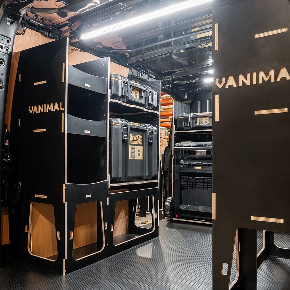 Rear van NS angle view of the Kia PV5 Cargo DeWalt ToughSystem Trolley Compatible Van Racking (x3 V1) displayed with DeWalt ToughSystem toolboxes and trolley