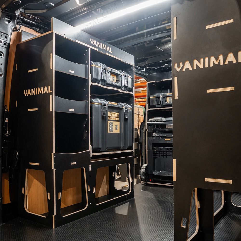 Rear van NS angle view of the Kia PV5 Cargo DeWalt ToughSystem Trolley Compatible Van Racking (x3 V1) displayed with DeWalt ToughSystem toolboxes, trolley and top trays