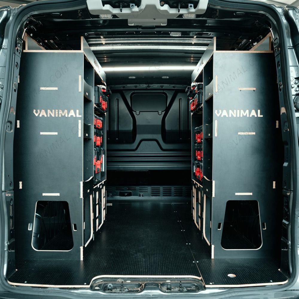 Rear van view of the Transit Custom 2023+ LWB Hexaboard Milwaukee PackOut Double Rear Racking - Packout Shelves + Grab Shelves