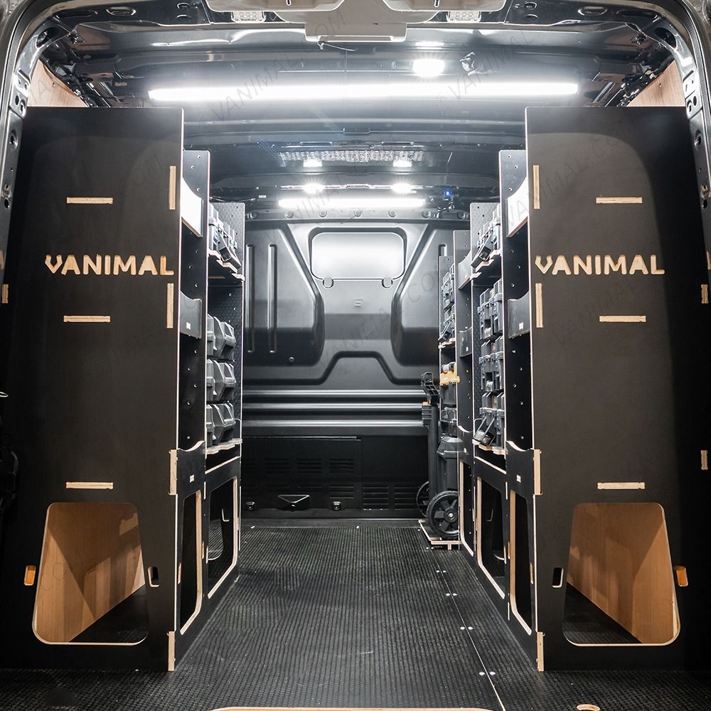 Rear van view of the Peugeot Expert 2016+ L2 DeWalt TSTAK Trolley Compatible Van Racking (x3 V2) displayed with DeWalt TSTAK toolboxes and trolley