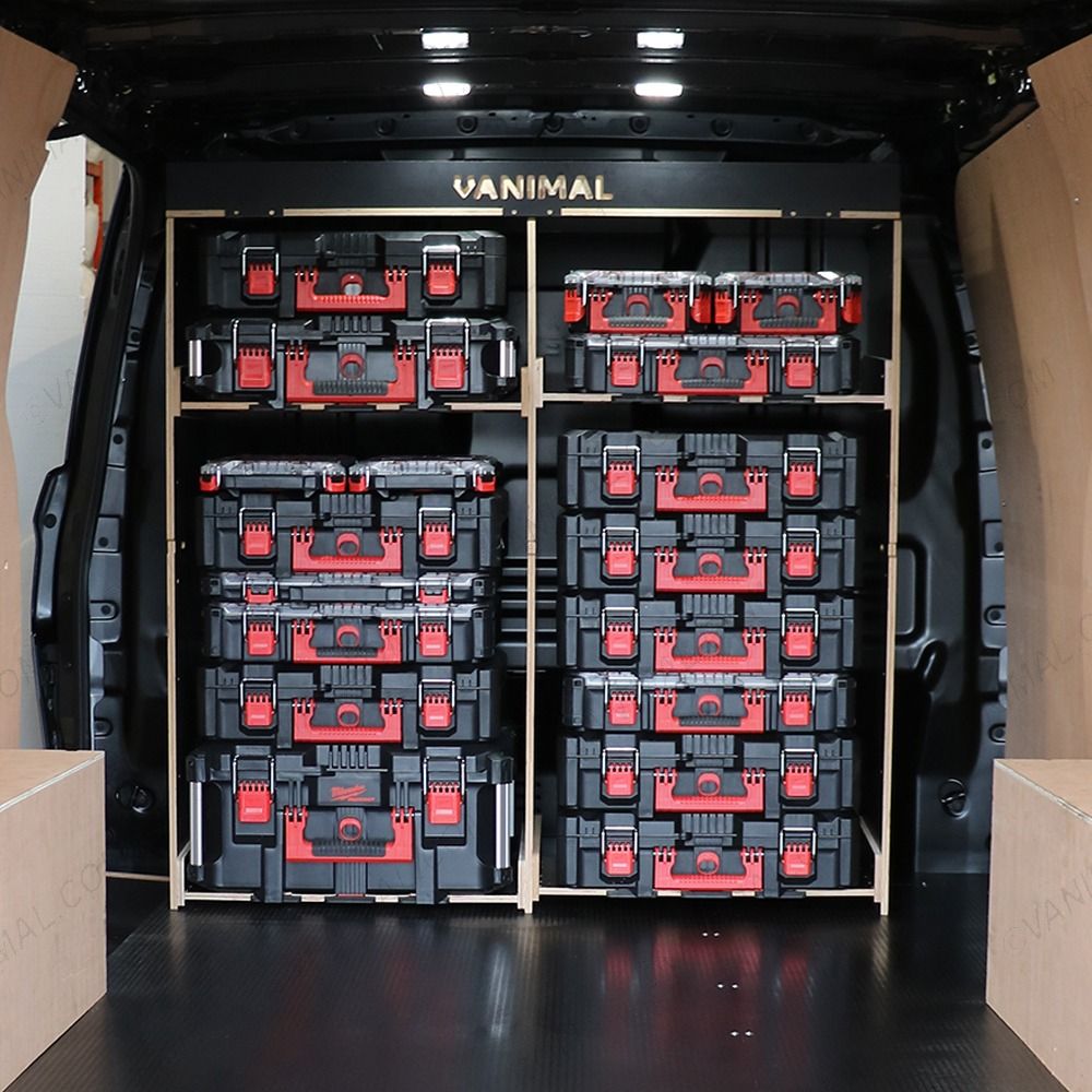 Rear van view of the Kia PV5 Cargo Milwaukee Packout Toolbox Compatible Van Racking - Bulkhead displayed with Milwaukee toolboxes and top tray