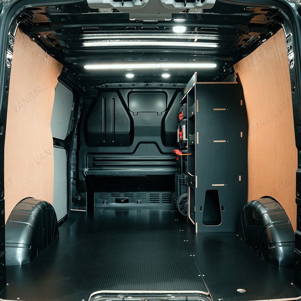 Rear van view of the Kia PV5 Cargo Milwaukee Packout Trolley Compatible Van Racking - Front displayed with Milwaukee toolboxes, trolley and top tray