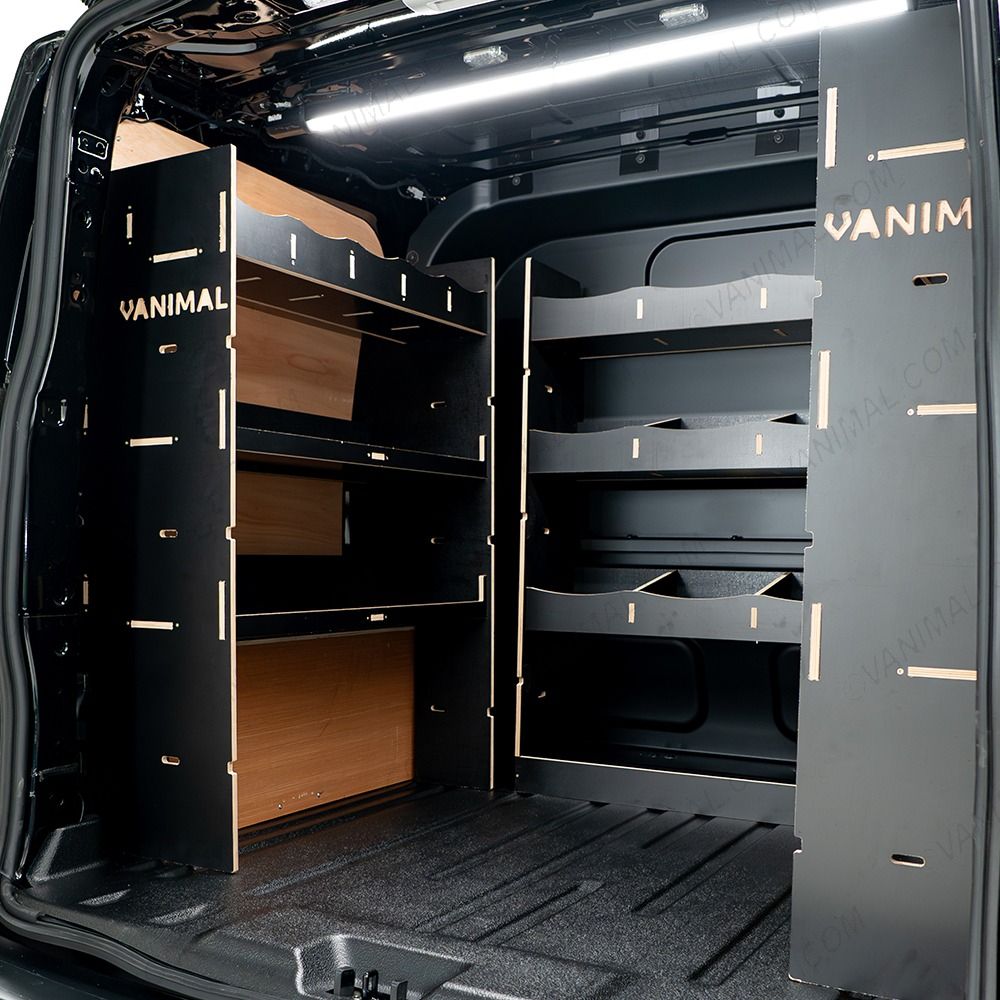 Rear van NS side angle view of the Ford Transit Custom 2024- LWB Crew Cab Twin MakPac and Bulkhead V2 Hexaboard Van Racking