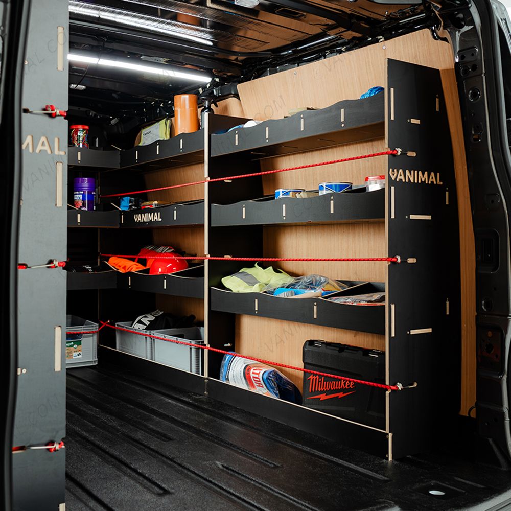 OS side view of the Ford Transit Custom SWB 2023-2023 Hexaboard Complete Full Van Racking Solution displaying equipment, tools and boxes 
