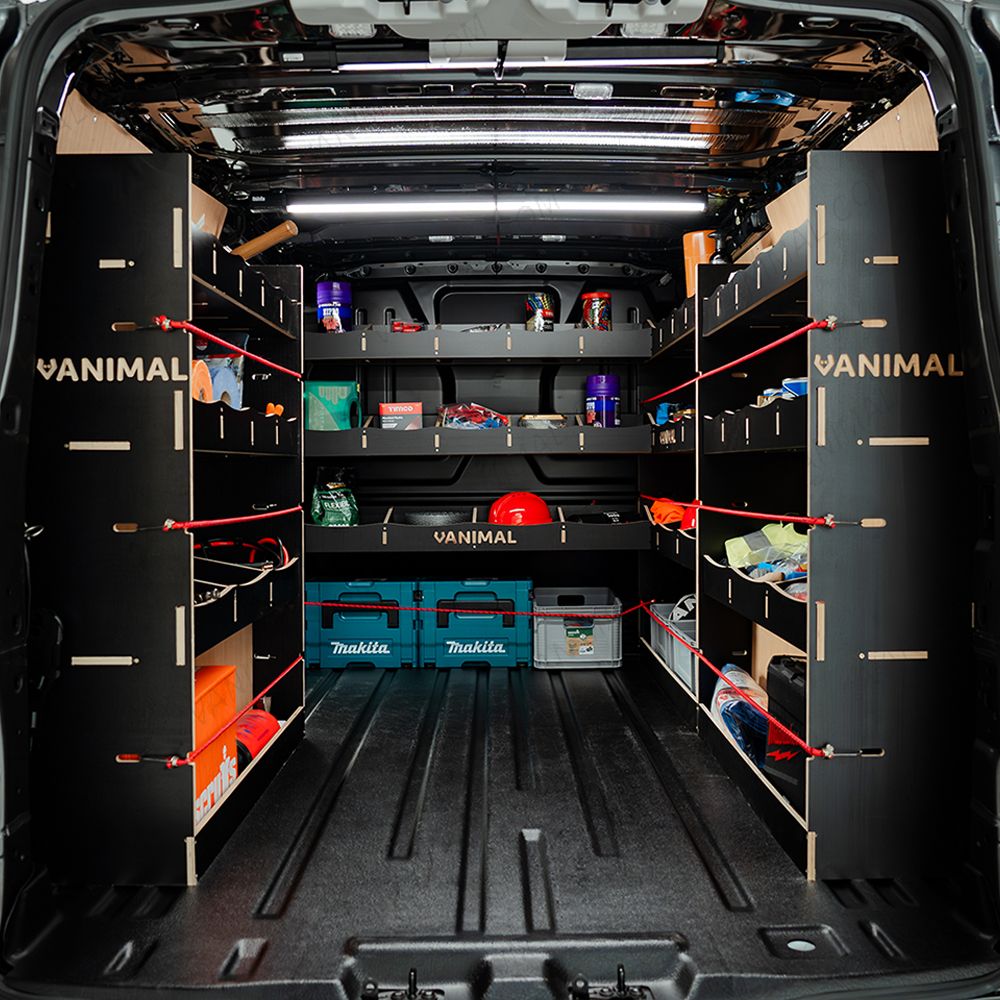 Rear van view of the Ford Transit Custom SWB 2023-2023 Hexaboard Complete Full Van Racking Solution displaying equipment, tools and boxes 