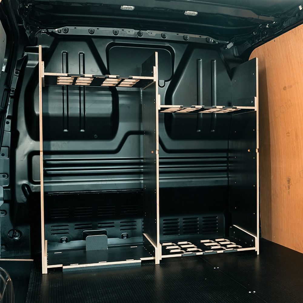 Rear van OS angle view of the Kia PV5 Cargo Milwaukee Packout Trolley Compatible Van Racking - Bulkhead