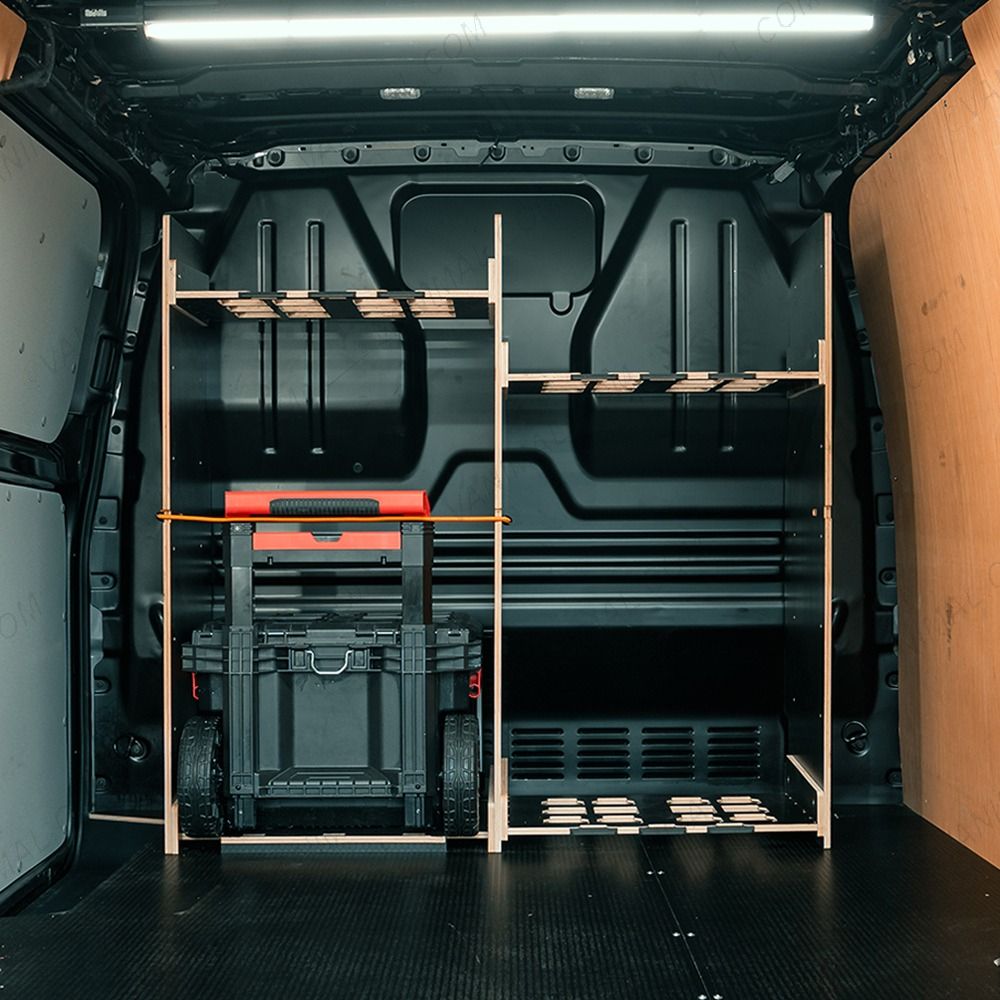Rear van view of the Kia PV5 Cargo Milwaukee Packout Trolley Compatible Van Racking - Bulkhead displayed with Milwaukee trolley