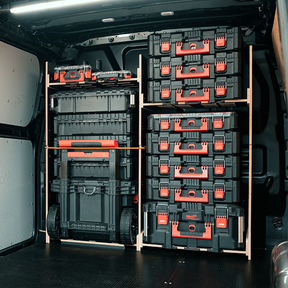 Rear van NS angle view of the Kia PV5 Cargo Milwaukee Packout Trolley Compatible Van Racking - Bulkhead displayed with Milwaukee toolboxes and trolley