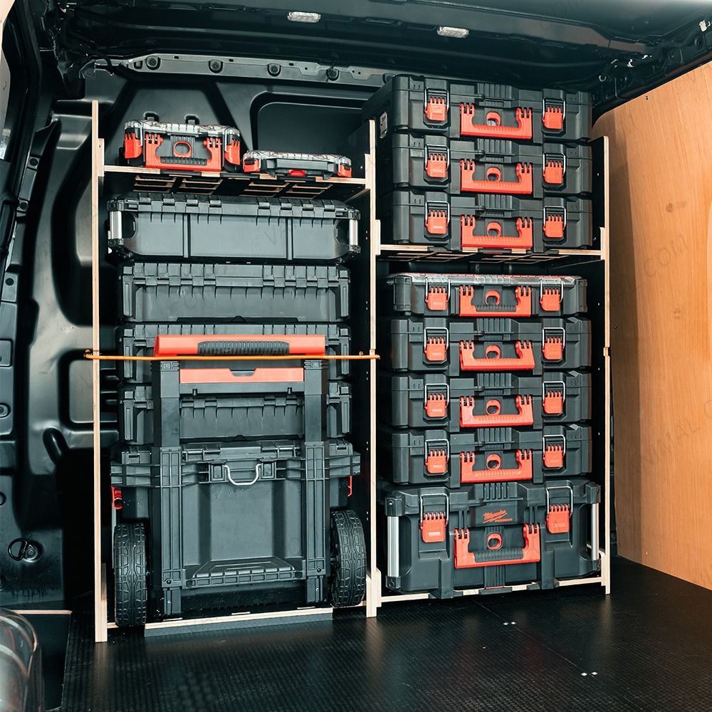 Rear van OS angle view of the Kia PV5 Cargo Milwaukee Packout Trolley Compatible Van Racking - Bulkhead displayed with Milwaukee toolboxes and trolley