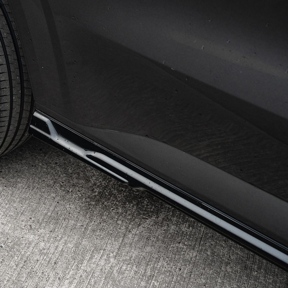 Close-up view of the rear section of the Ford Transit Custom 2023- Gloss Black Side Skirts