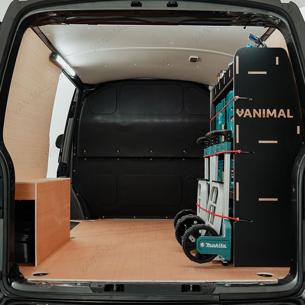 Rear van view of the VW Transporter T5/T6 L1 Hexaboard OS Rear MakPac/Toolbox Shelves & Compartments - Makita tools displayed