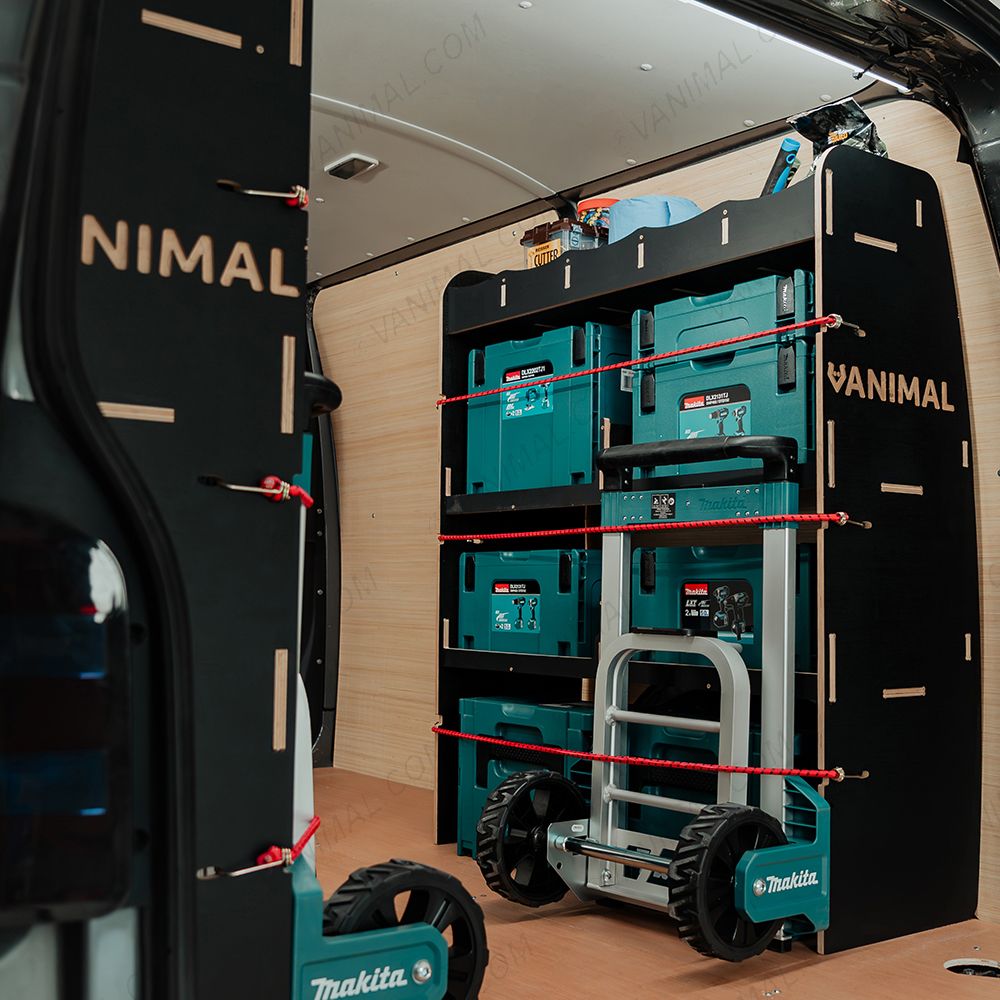 OS side view of the Fiat Scudo SWB Hexaboard Double Rear MakPac/Toolbox Van Racking displayed with Makita toolboxes and trolleys