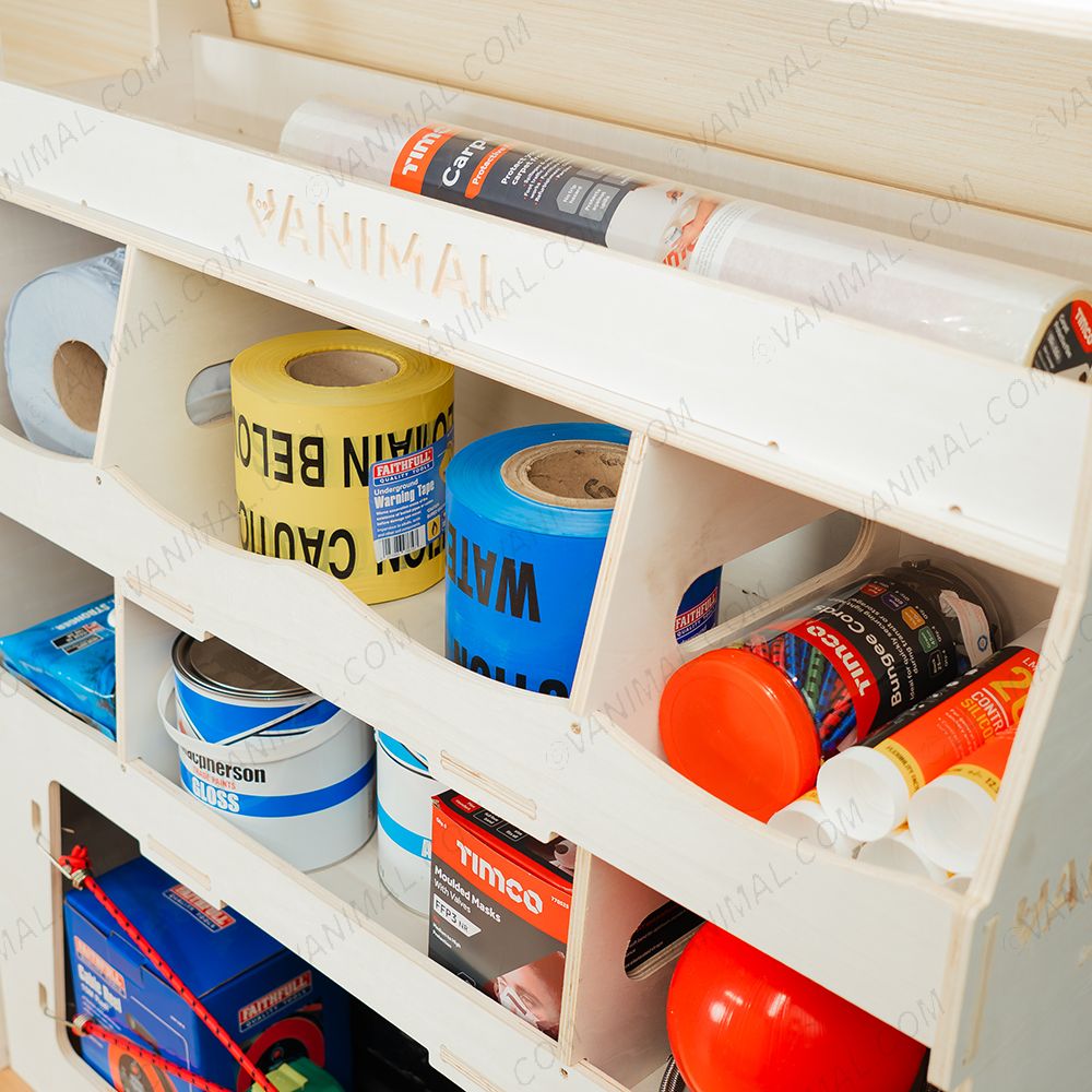 Close-up view of the Fiat Scudo Rear Ulti-Rack Van Racking compartments displayed with tools