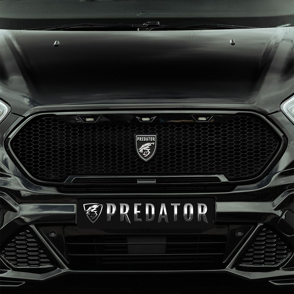Close-up view of the Predator MesH Grille on the Agate Black Transit Custom model