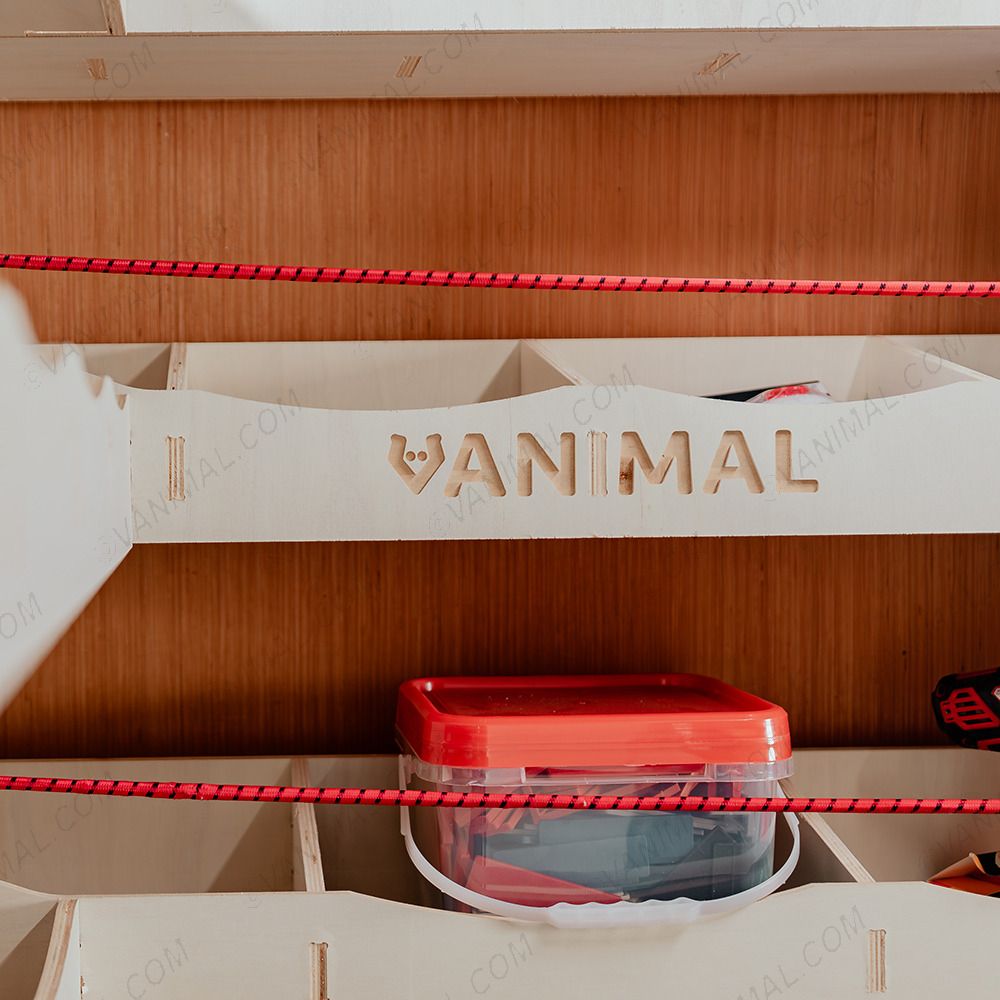 Close-up view of the racking compartments and Vanimal branding