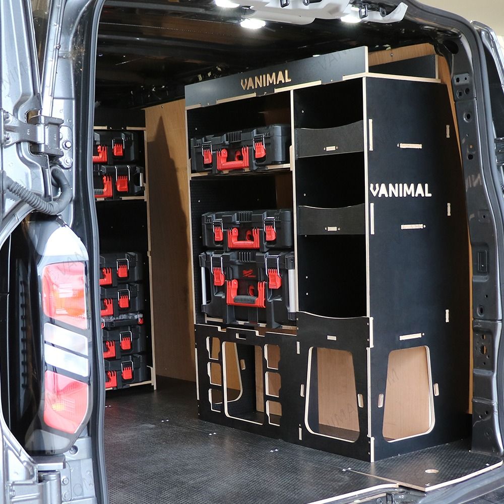 Rear van OS angle view of the Kia PV5 Cargo Milwaukee Packout Toolbox Compatible Van Racking (x2 V2) displayed with Milwaukee toolboxes and top trays