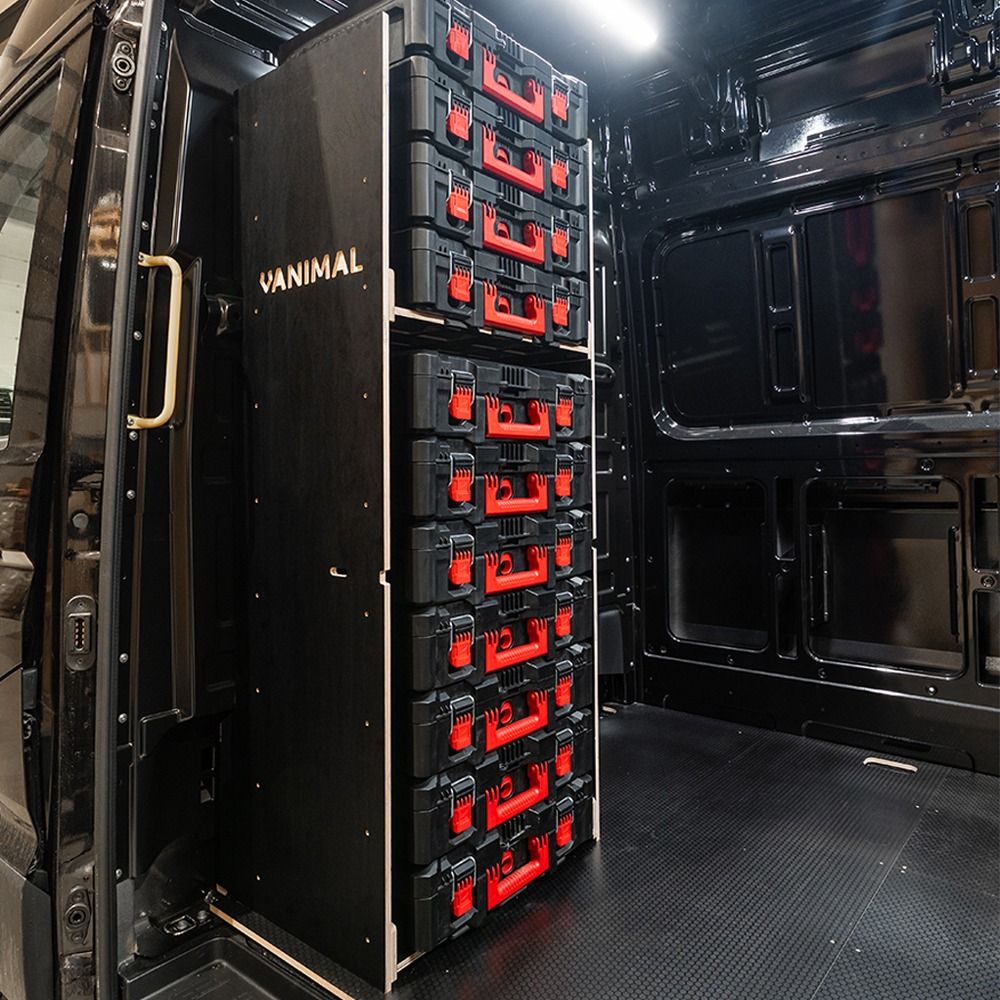 Side van view of the VW Crafter 2017+ Milwaukee Packout Toolbox Compatible Van Racking - Bulkhead displayed with Milwaukee toolboxes