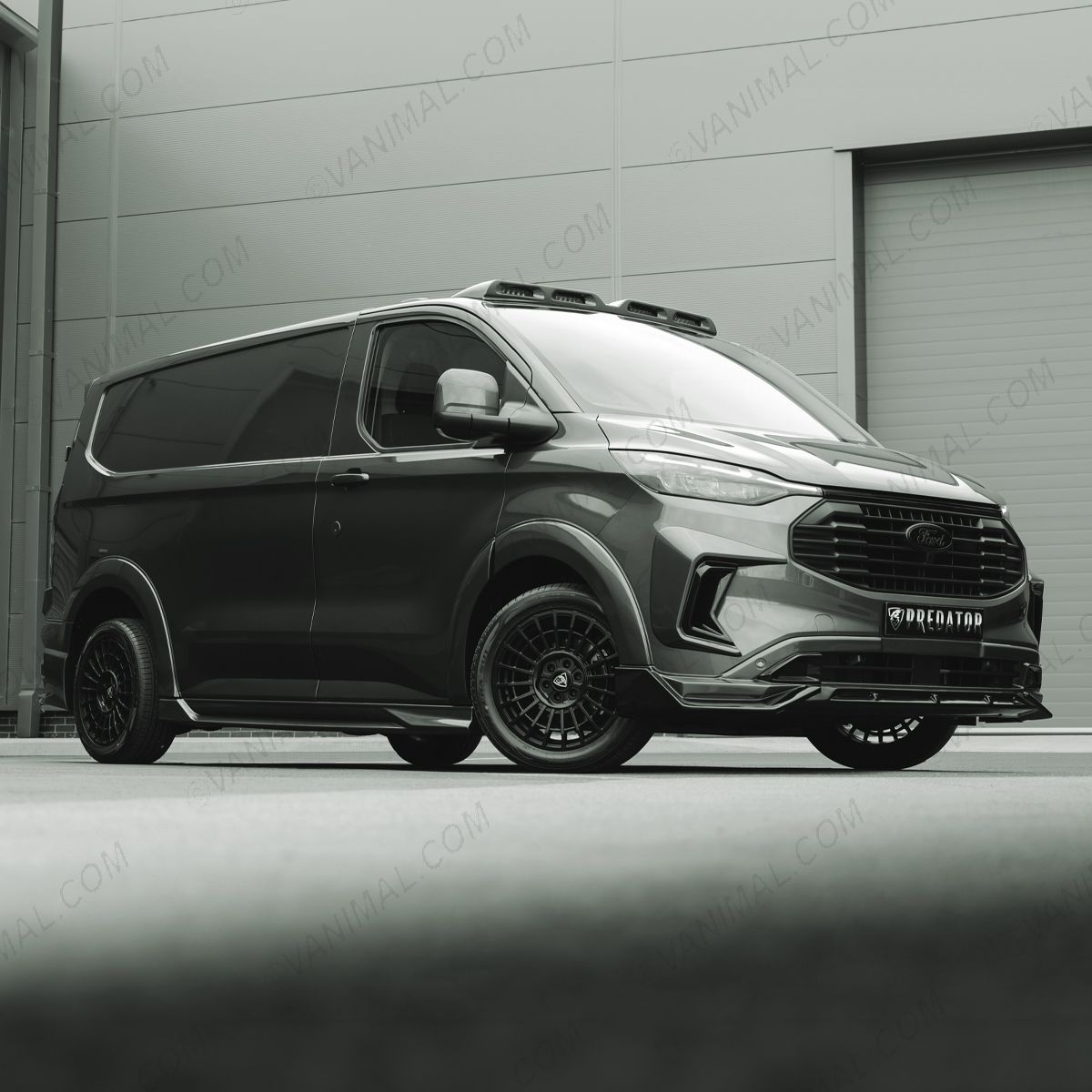 Front side angle view of the Ford Transit Custom 2023- Full Predator Body Kit LWB with Rear Door Spoiler