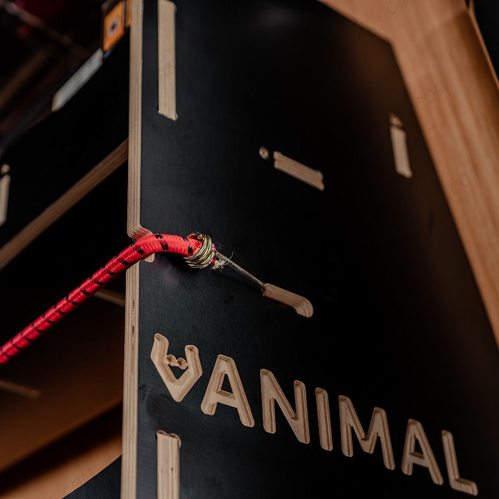 Close-up side panel view of the Vanimal branding and pre-notched for bungee cords