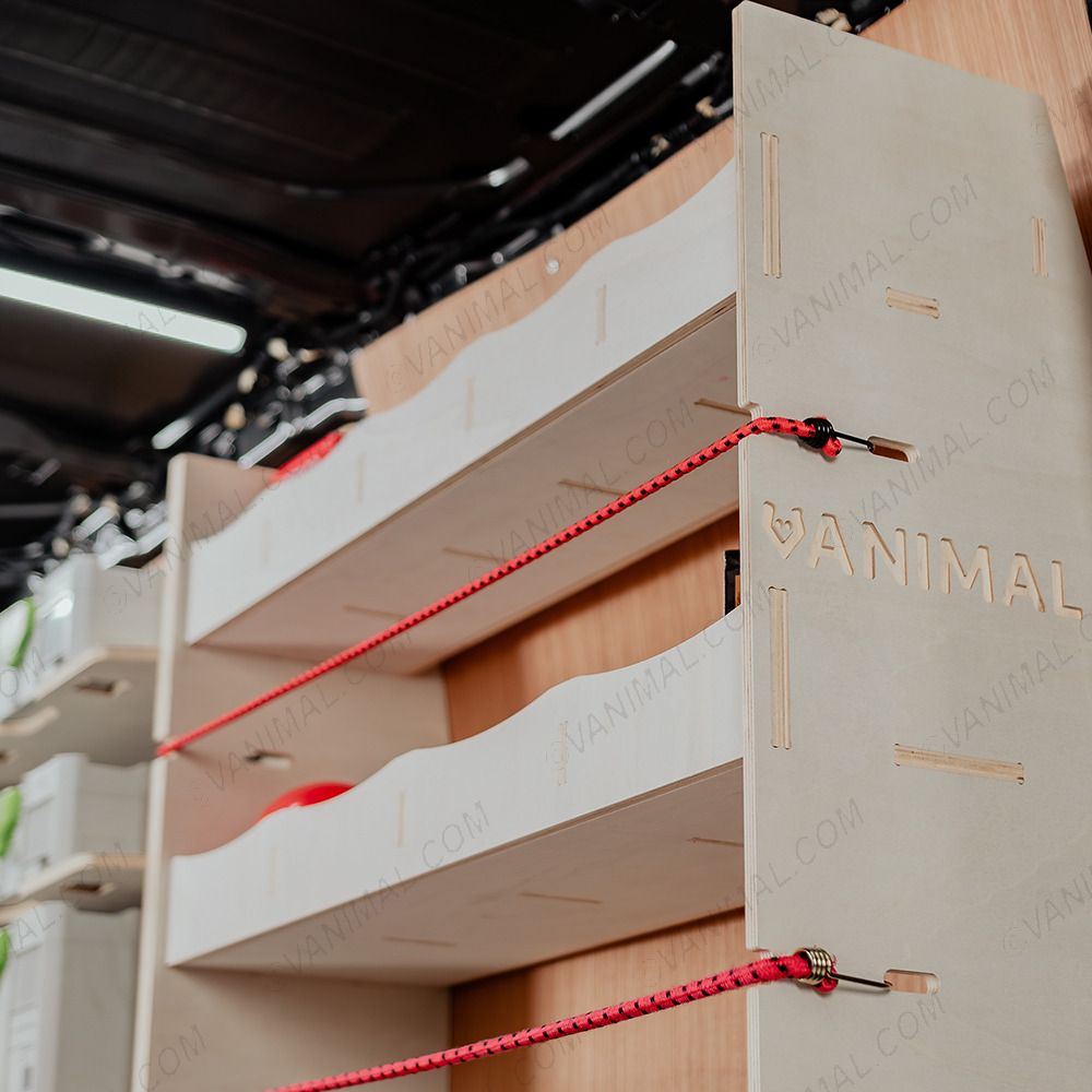 Close-up side panel view of the Vanimal branding and pre-notched for bungee cords